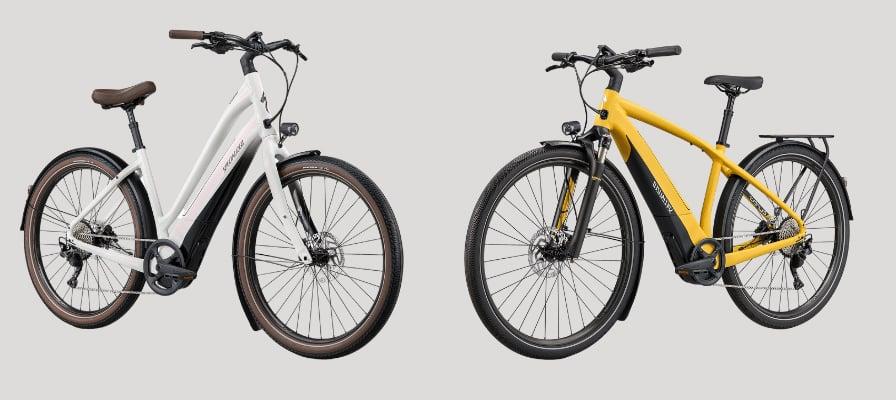 Zwei moderne E-Bikes in Weiß und Gelb auf grauem Hintergrund